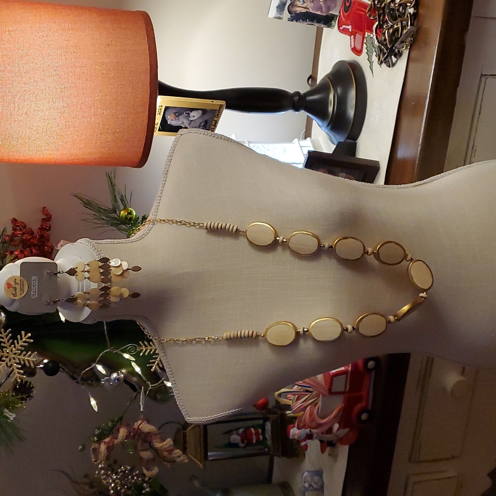 Chicos earrings and a necklace
